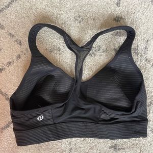 Lululemon BLK with gold thin stripes sports bra
